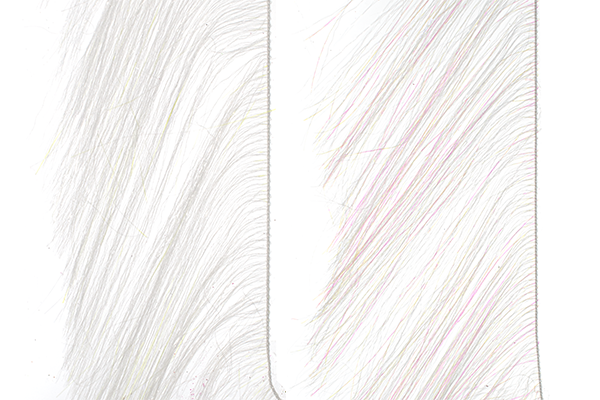 Senyo's Predator Wrap, Clear/Pearl and Clear/UV side by side