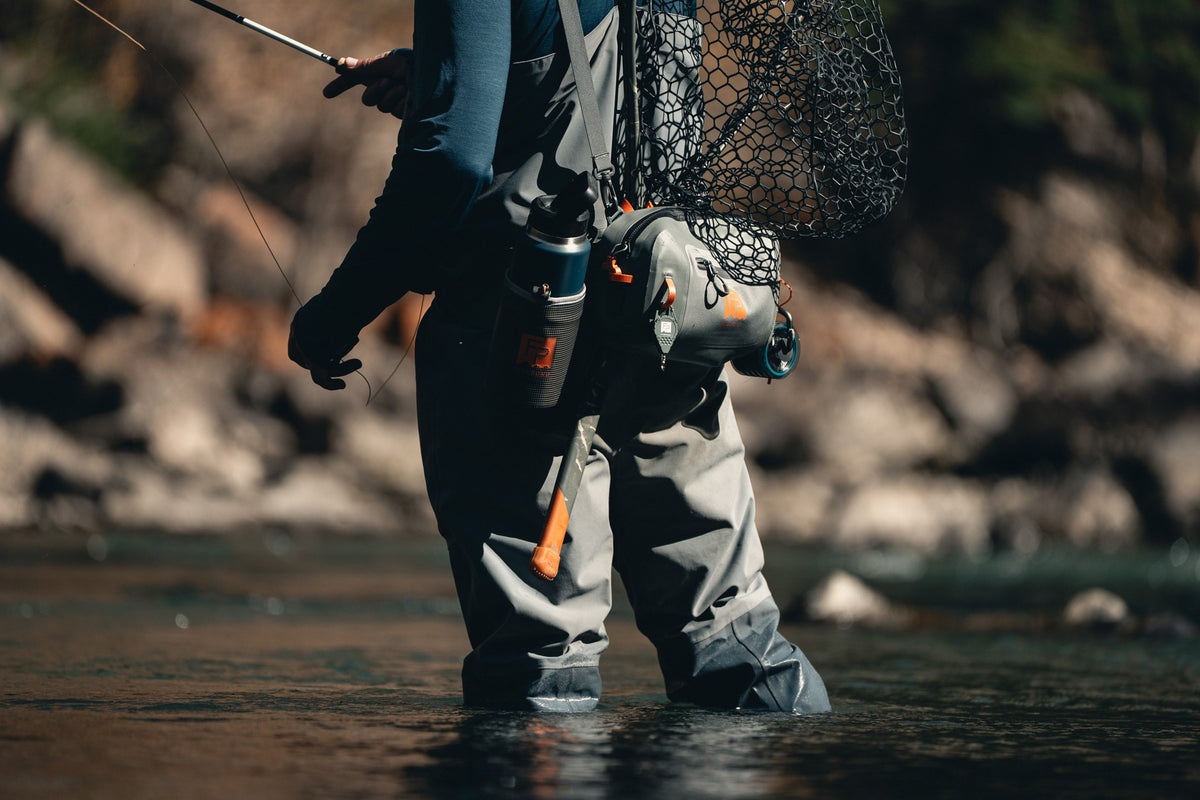 Fishpond Thunderhead HD Small Lumbar, worn by angler wading