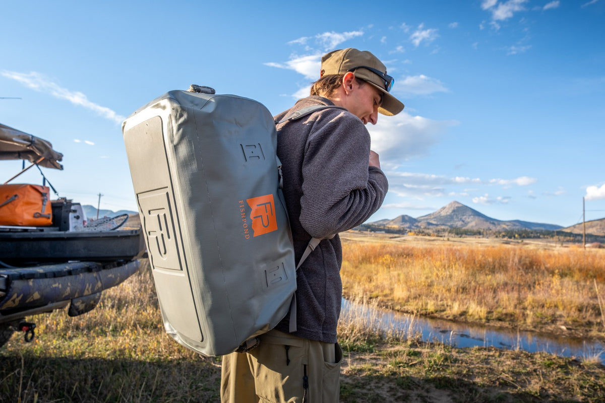 Fishpond Thunderhead HD Duffel - Overcast Grey, worn as a backpack