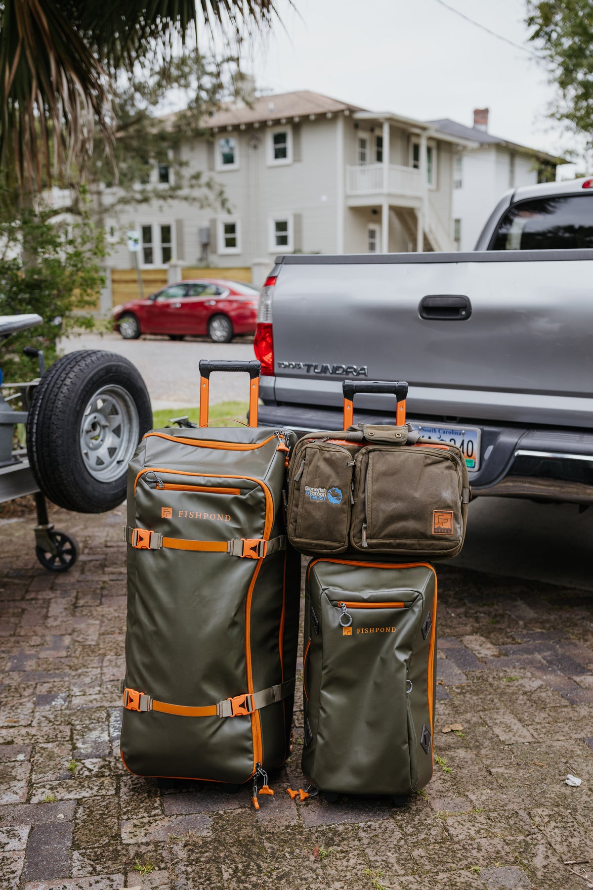 Fishpond Stormshadow Rolling Carry-On - Green