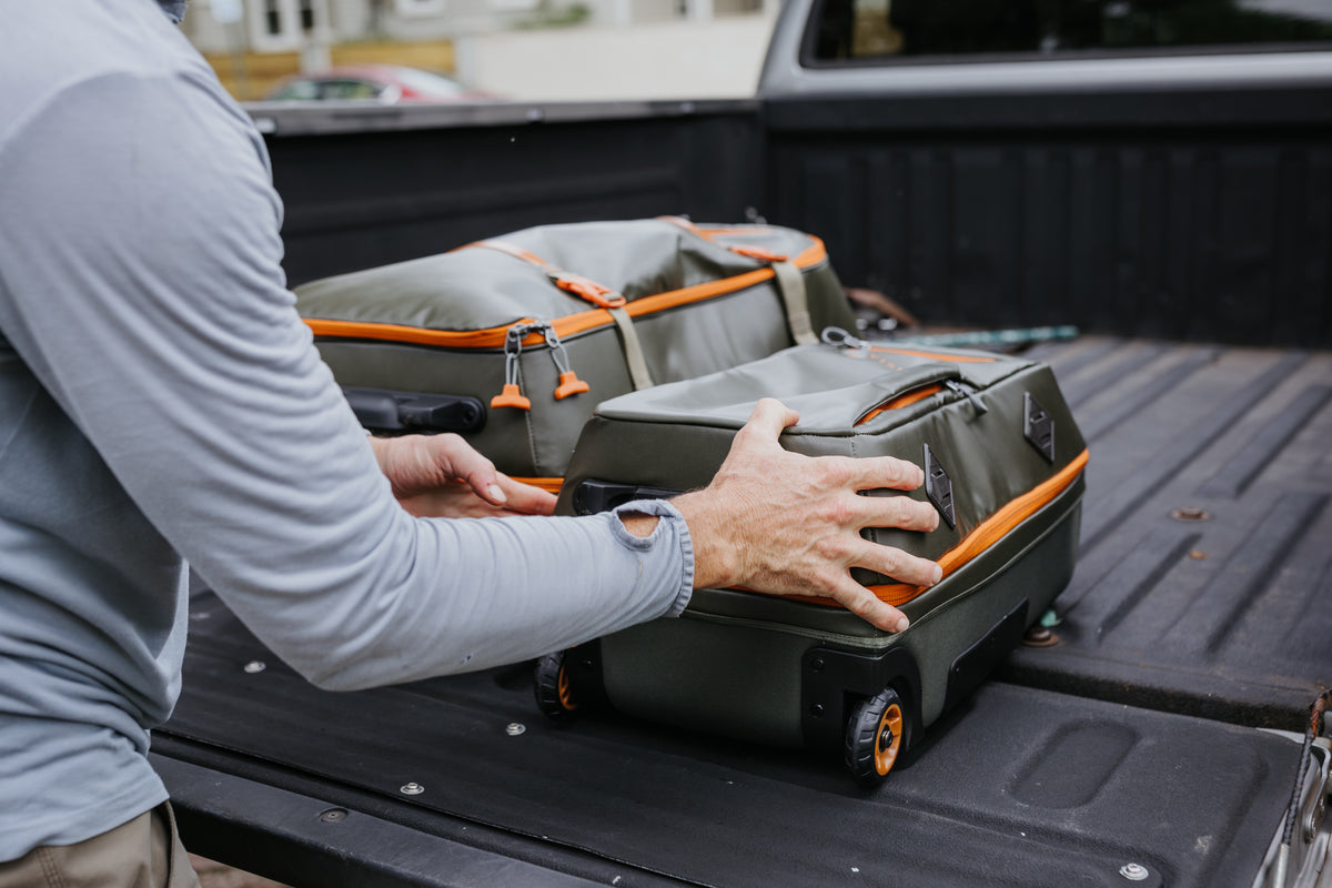 Fishpond Stormshadow Rolling Carry-On - Green