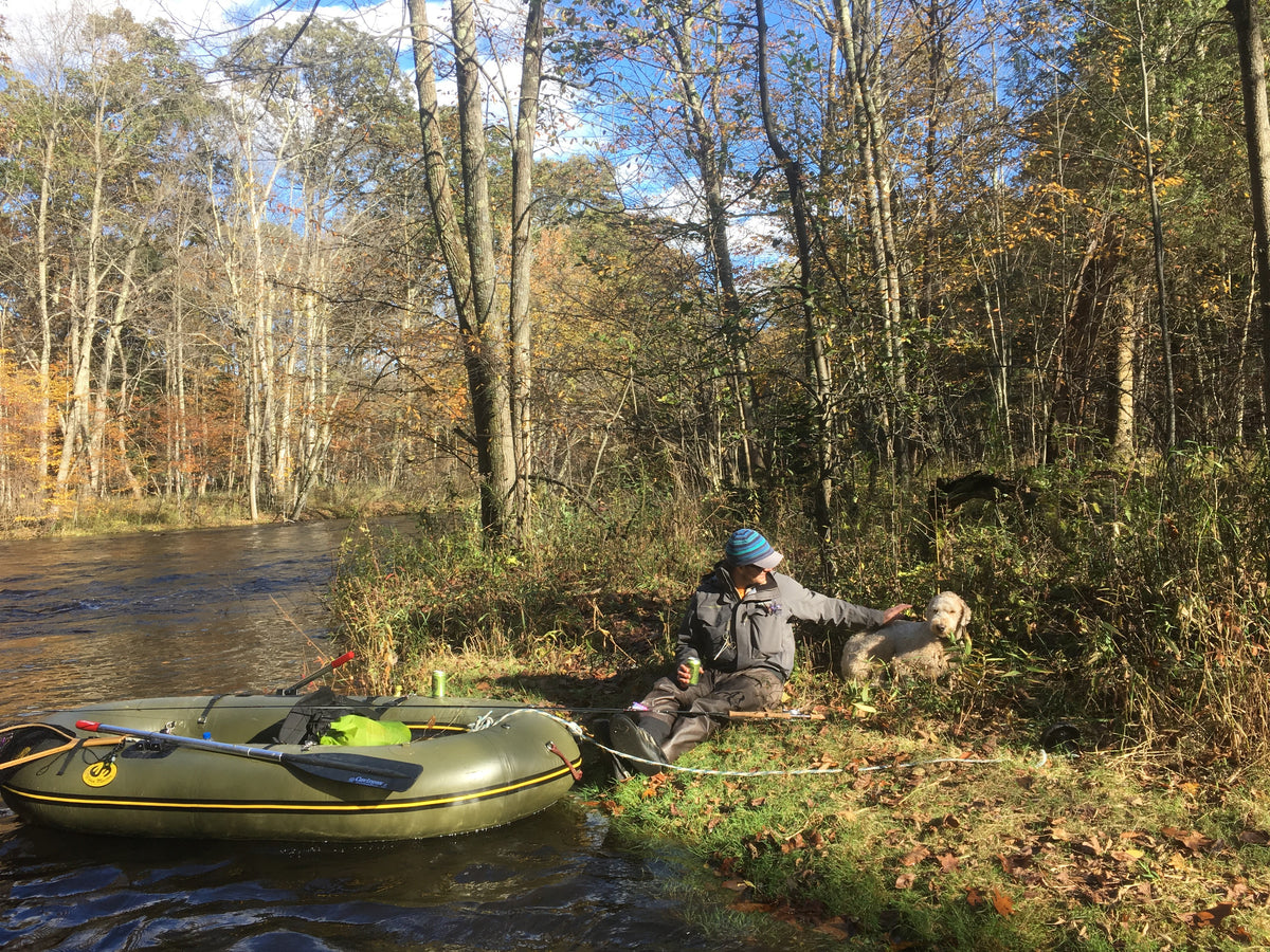 Water Master Kodiak Raft Fishing In Michigan with Dog